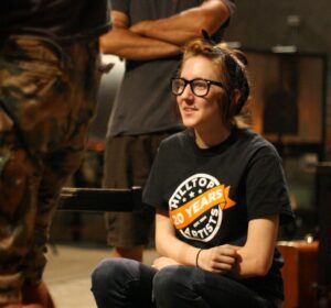 Hilltop Artist student Dani in the hot shop at Museum of Glass during a residency demonstration.