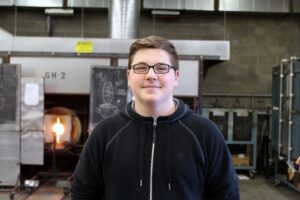 Hilltop Artist Julian in the hot shop.