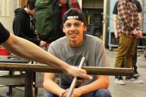 Hilltop Artist Kenny in the hot shop during a demonstration.