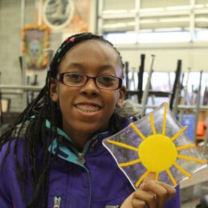 Hilltop Artist Nanita shows off fusion pieces created in the hot shop.