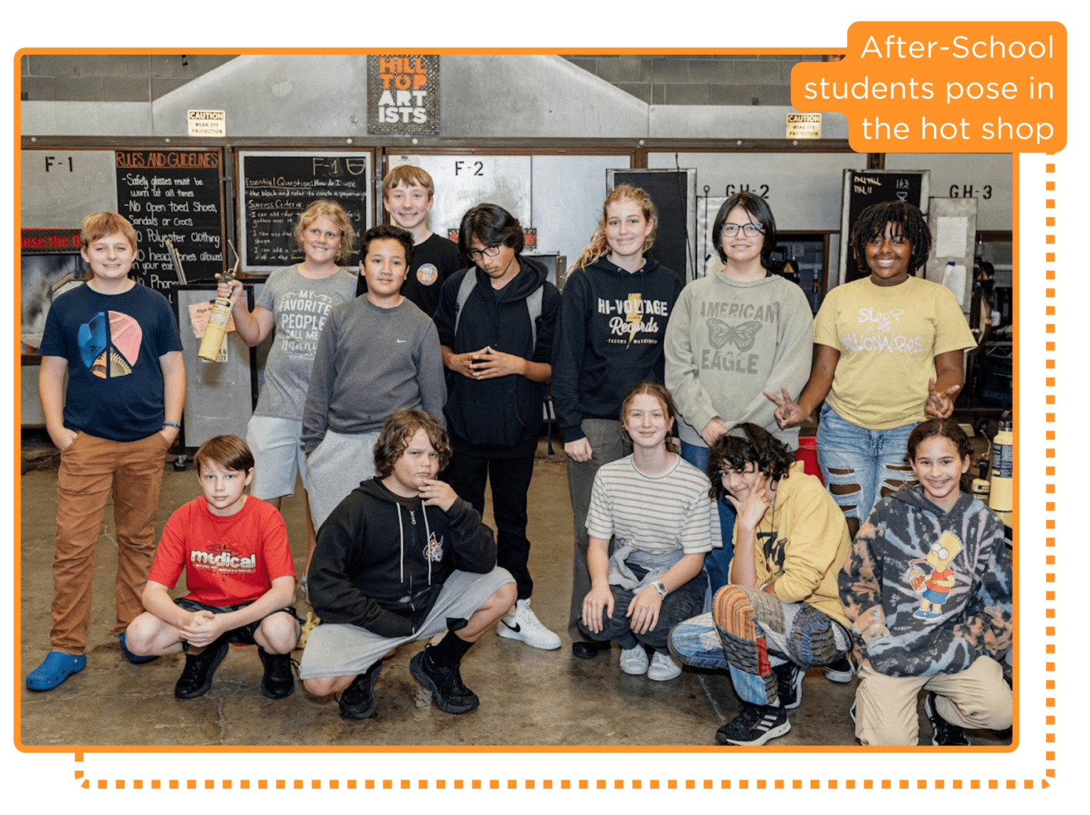 Afterschool students pose in the hot shop