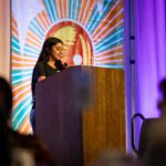 Photograph of student speaker Priscilla at the 2025 Better Futures Luncheon