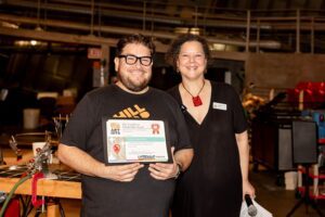 Luis Sanchez is awarded with the Greg Piercy Scholarship Award during the summer residency at the Museum of Glass.
