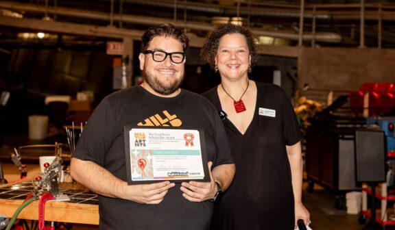 Luis Sanchez is awarded with the Greg Piercy Scholarship Award during the summer residency at the Museum of Glass.,