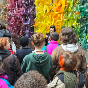 Image of Hilltop Artists students during a tour of the Chihuly Boathouse.