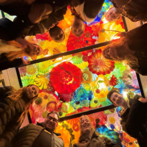 Image of Hilltop Artists students during a tour of the Chihuly Boathouse.