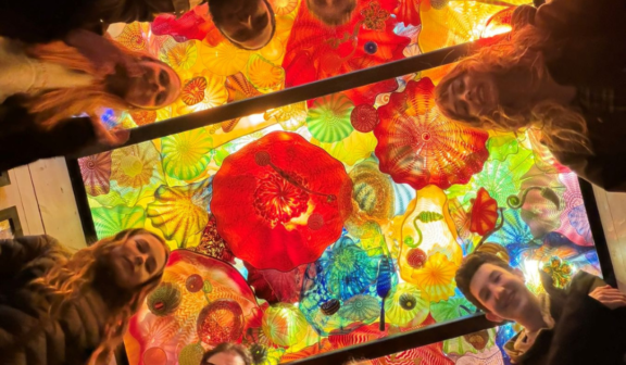Image of Hilltop Artists students during a tour of the Chihuly Boathouse.