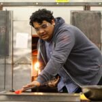David Rios in the Hilltop Artists hot shop at Hilltop Artists, 2014