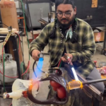 David Rios working on a piece in the hot shot